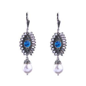 CRYSTAL AND SIMULATED PEARL EYE EARRINGS